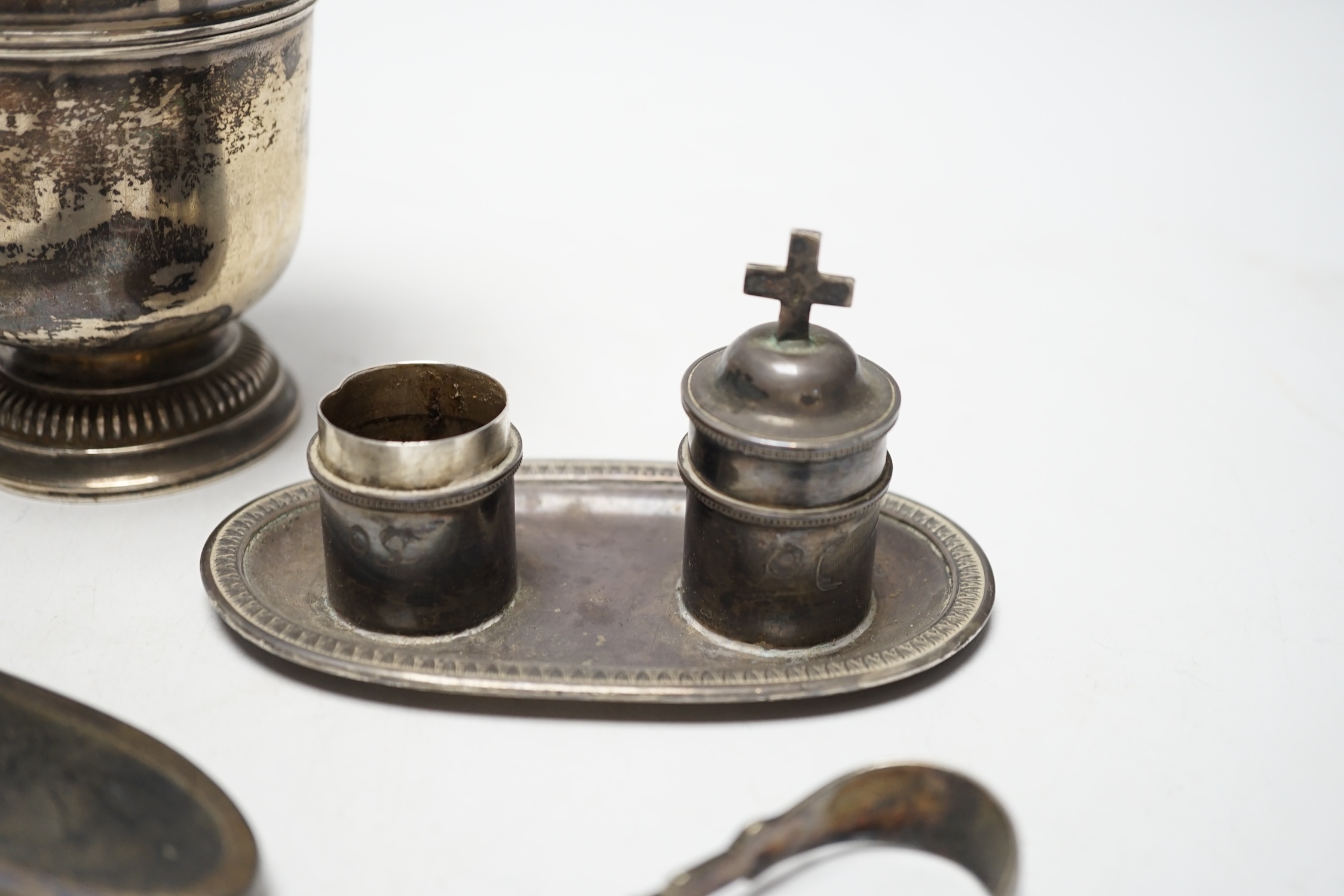 A French white metal small pedestal vase, 10.8cm, a silver and tortoiseshell mounted hand mirror and three other items including a pair of silver sugar tongs.